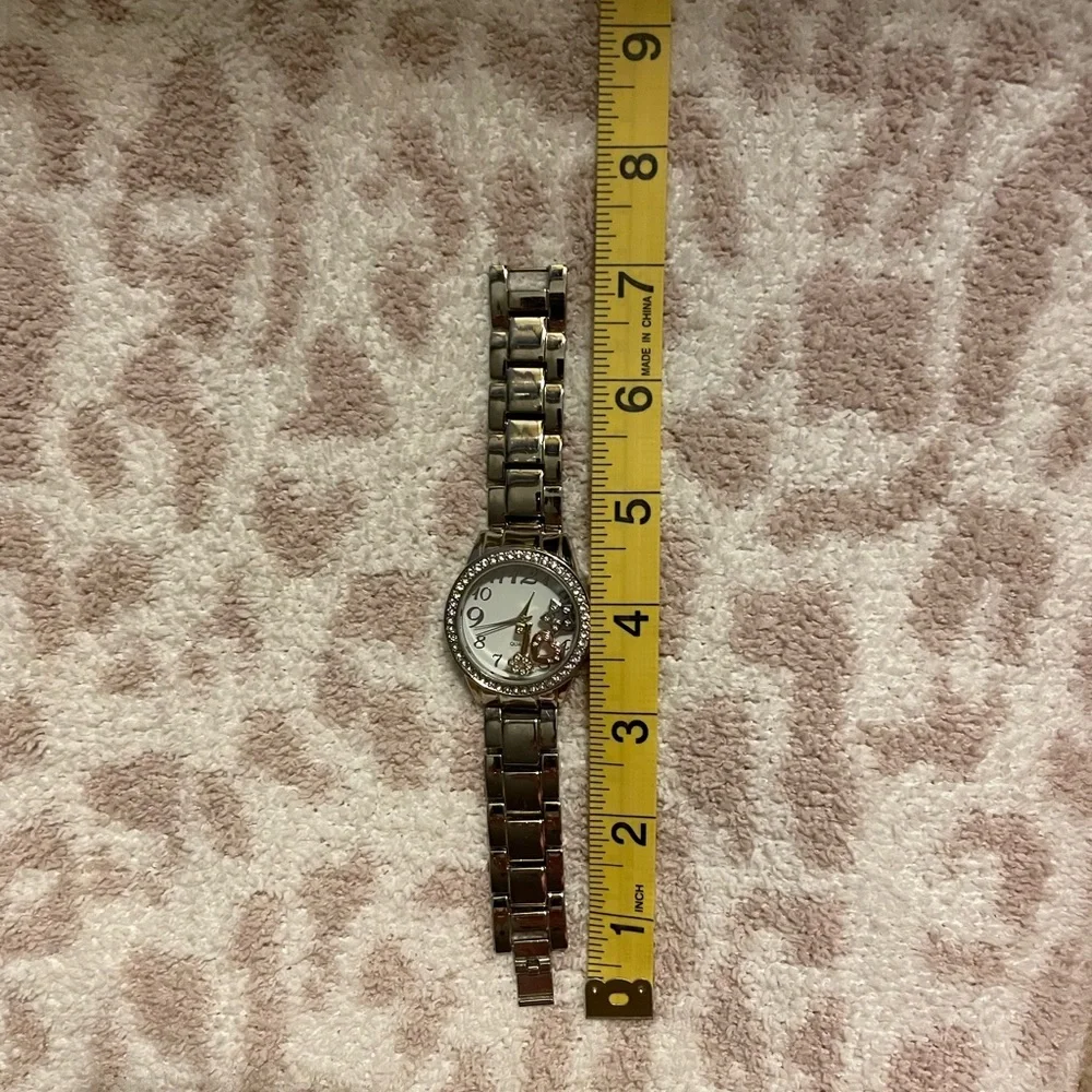 VGC Vintage AVON Floating Charms Silver tone Wristwatch. - Picture 11 of 16